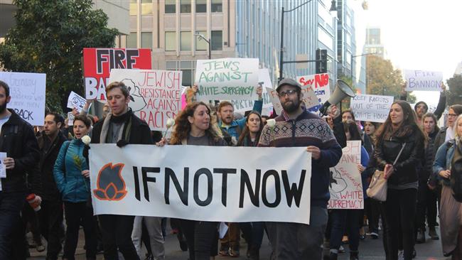 Pro-Palestine activists march outside of the American Israel Public Affairs Committee conference in Washington, DC on Sunday.