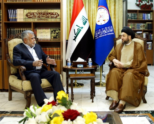 السيد عمار الحكيم والعامري