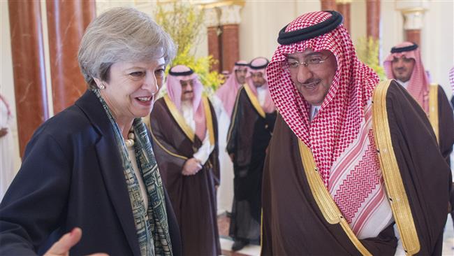 Saudi Crown Prince Mohammad bin Nayef bin Abdulaziz Al Saud (R) meets with British Prime Minister Theresa May in the capital Riyadh, April 4, 2017. (Photo by AFP)