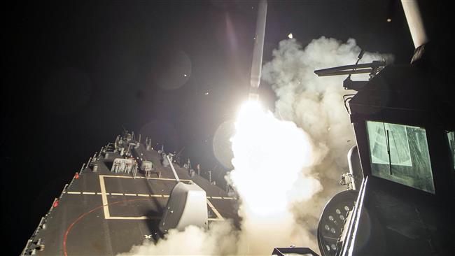 USS Ross (DDG 71) fires a tomahawk land attack missile