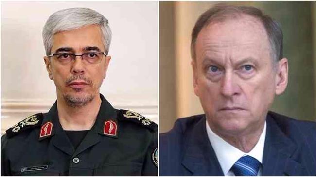 Chief of Staff of the Iranian Armed Forces Major General Mohammad Baqeri (L) and his Russian counterpart, Valery Vasilevich Gerasimov