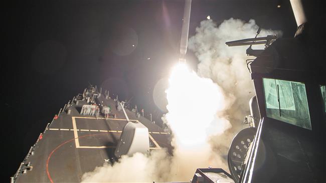 U.S. Navy guided-missile destroyer USS Ross (DDG 71) fires a tomahawk land attack missile in Mediterranean Sea