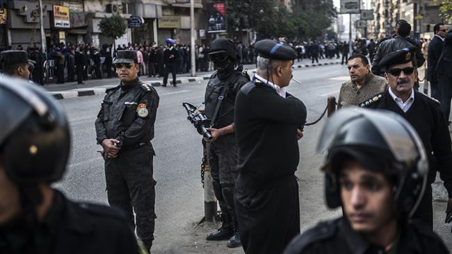 Egyptian security forces stand guard at the scene of a bomb explosion that targeted Saint Peter and Saint Paul Coptic Orthodox Church in Cairo on December 11, 2016.