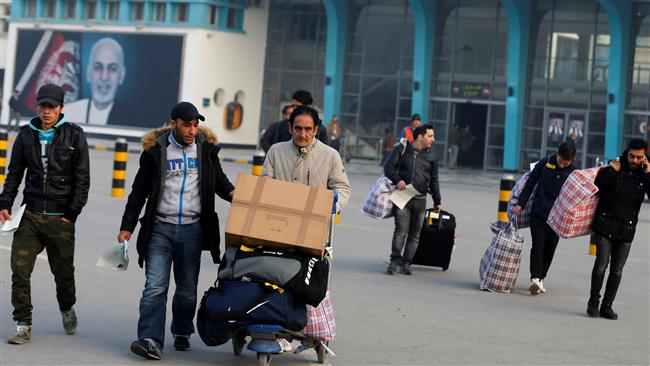 The Afghan nationals whose asylum applications have been rejected arrive from Germany in an airport in Kabul, Afghanistan, December 15, 2016. (Photo by AFP)