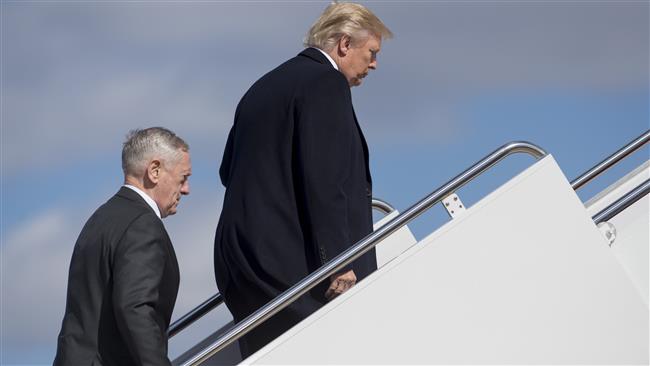 US President Donald Trump and Secretary of Defense Jim Mattis (L) board Air Force One prior to departing from Andrews Air Force Base in Maryland, March 2, 2017. (Photos by AFP)