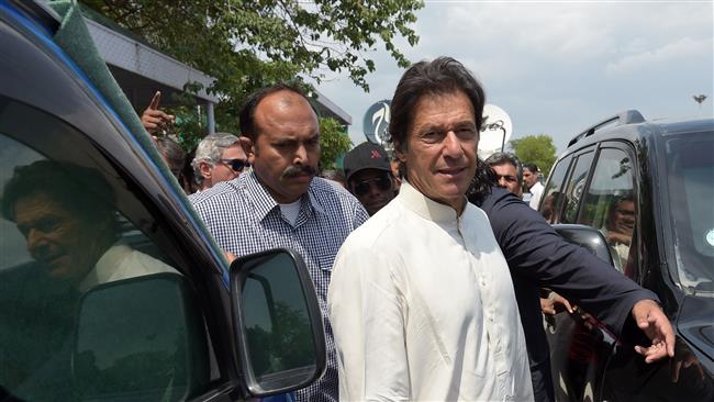 Pakistani opposition leader and head of the Pakistan Tehreek-i-Insaf (PTI) party Imran Khan leaves the Supreme Court after attending a hearing on the Panama Papers case against PM Sharif in Islamabad on May 22, 2017. (Photo by AFP)