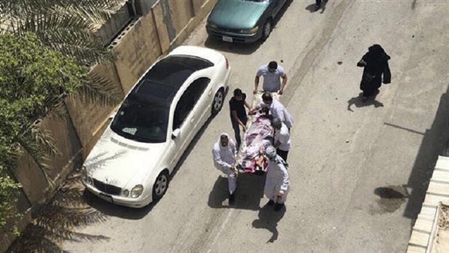 This image provided by an activist who requested to remain unnamed shows people carrying a man who was injured in a raid on a sit-in in Diraz, Bahrain, May 23, 2017. (Photo by AP)