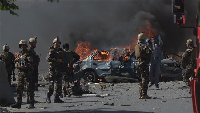 Afghan security forces are seen at the site of a car bomb attack in Kabul on May 31, 2017. (Photo by AFP)