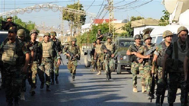 Lebanese soldiers patrol near the site of bomb attacks in the Christian village of Qaa, on the border with Syria, June 28, 2016. (Photo by Reuters)