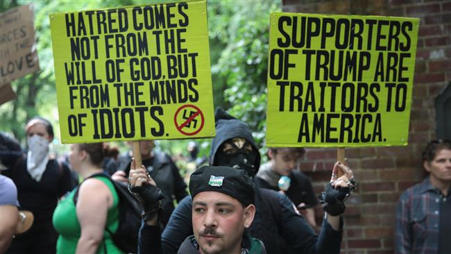 Demonstrators gather in Portland, Ore., June 4, 2017, for competing rallies after two men were stabbed to death in May on a commuter train while protecting two teenage girls from a man casting anti-Muslim slurs. (file photo)