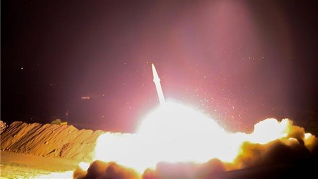 Frame grab from broadcast footage shows the Islamic Revolution Guards Corps firing a ballistic missile against Takfiri targets in eastern Syria.