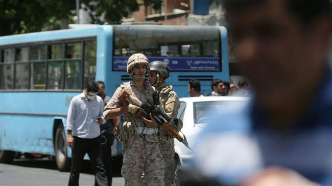Members of Iranian forces stand guard during an attack on the Iranian Parliament in central Tehran, Iran, June 7, 2017. (Photo by Reuters)