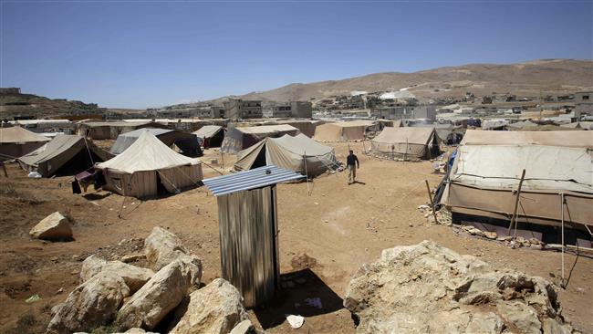 The photo taken on June 14, 2013 shows tents at the Arsal refugee camp in the Lebanese Bekaa valley that hosts Syrian families who fled the conflict in Syria. (Photo by AFP)