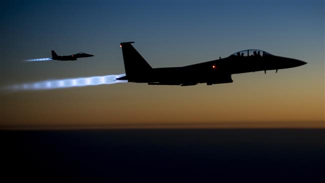 US Air Force F-15E Strike Eagles fly over northern Iraq after conducting airstrikes in Syria.