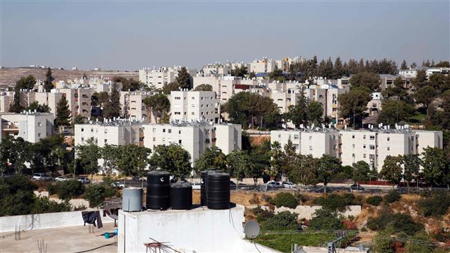 A picture taken from the West Bank city of al-Khalil (Hebron) on June 25, 2017 shows a view of the Kiryat Arba Jewish settlement on the outskirts of the Palestinian city. (By AFP)