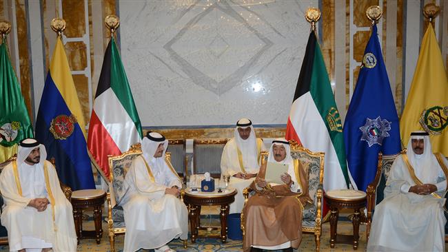 A photo released by Kuwaiti Emiri Diwan shows Sheikh Sabah al-Ahmad al-Jaber al-Sabah (2nd-R), Emir of Kuwait, reading a message received from the Emir of Qatar after it was delivered by Qatari Foreign Minister Sheikh Mohammad bin Abdulrahman Al Thani (2nd-L), at Bayan palace in Kuwait City on July 3, 2017. (via AFP)