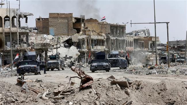 Vehicles of the Iraqi Federal Police are seen during the fight against Daesh Takfiri terrorists in the Old City of Mosul, Iraq, on July 3, 2017. (Photo by Reuters)