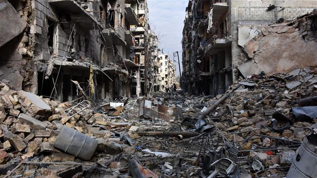 The photo taken on December 7, 2016 shows a general view of destruction in the al-Shaar neighborhood after Syrian government forces took control of the area in the eastern part of the northern city of Aleppo. (AFP photo)