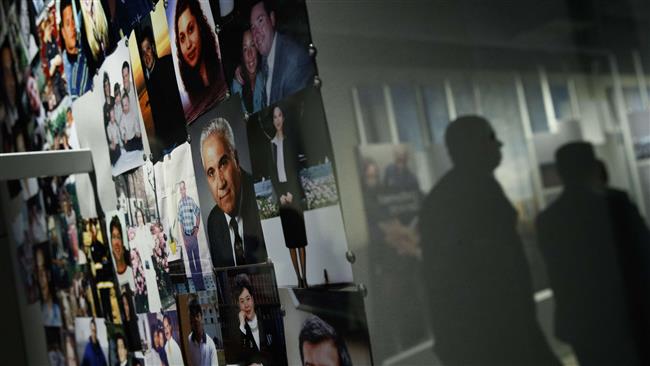 Photographs of 9/11 victims are displayed in a room in the new 9/11 Tribute Museum, June 13, 2017 in New York City. (Getty Images)