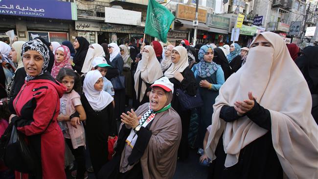 Protesters chant slogans in the Jordanian capital, Amman, on July 15, 2017 during a demonstration against Israel
