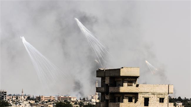 Smoke is seen following an airstrike on the western frontline of Raqqah on July 17, 2017, during an offensive by the US-backed Syrian Democratic Forces, a majority Kurdish and Arab alliance, to retake the city from the Daesh terrorist group. (Photo by AFP)