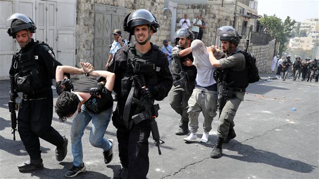 Israeli forces arrest Palestinian men following clashes outside Jerusalem al-Quds’ Old City on July 21, 2017. (Photo by Reuters)
