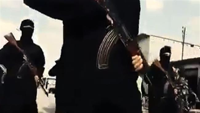 This September 23, 2014 photo shows an image grab taken from a video allegedly showing Daesh recruits marching in an unknown location. (Via AFP)
