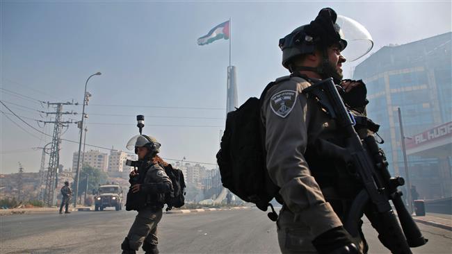 Israeli forces are seen during clashes with Palestinians near the Jewish settlement of Beit El, on the outskirts of the occupied West Bank city of Ramallah, on July 28, 2017. (Photo by AFP)