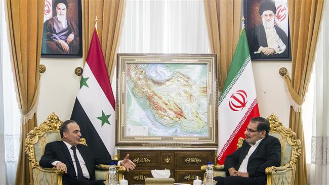 Secretary of Iran’s Supreme National Security Council Ali Shamkhani (R) meets with Syrian Prime Minister Imad Khamis in Tehran on August 6, 2017. (Photo by IRNA)