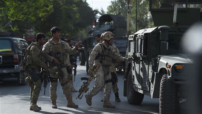Afghan security forces are seen at an attack scene in the capital, Kabul, on July 31, 2017. (Photo by AFP)