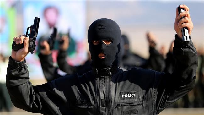 The file photo shows Iranian security forces.
