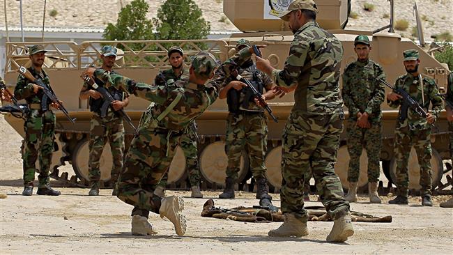 In this July 18, 2017 photo, Iraqi volunteer forces train in their camp in Najaf. (By AP)