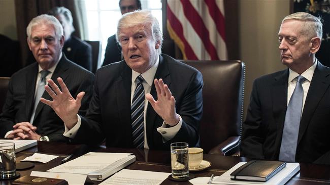 US President Donald Trump speaks to the press with Secretary of State Rex Tillerson (L) and Defense Secretary James Mattis as he meets with his cabinet at the White House on March 13, 2017. (AFP photo)