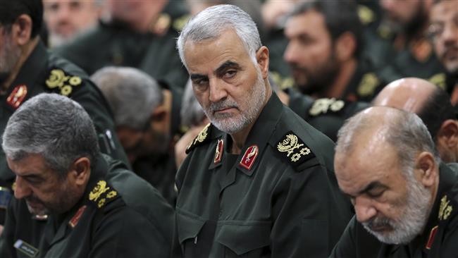 In this September 18, 2016 photo released by an official website of the office of Leader of the Islamic Revolution Ayatollah Seyyed Ali Khamenei, Major General Qassem Soleimani, center, attends a meeting with the Leader in Tehran. (Via AP)