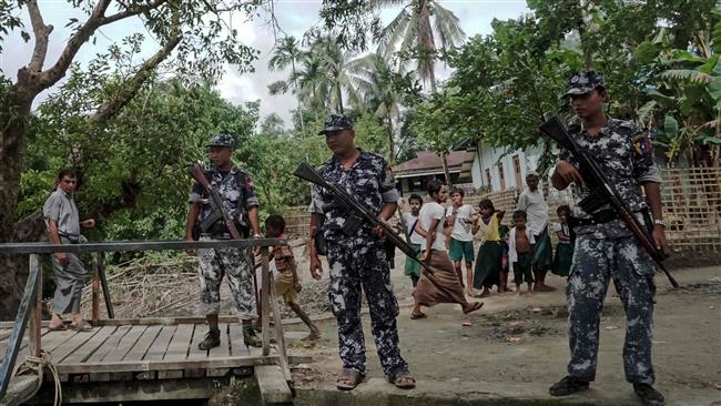 This photo taken on July 13, 2017 shows border police in Ngayantchaung village, Myanmar
