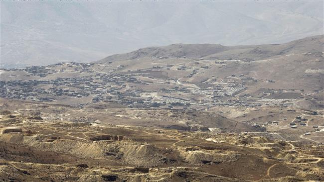 A picture taken on August 2, 2017 shows the Lebanese town of Arsal from across the border with Syria in a mountainous area around the town of Flita. (Photo by AFP)