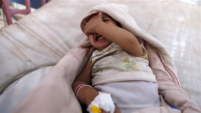 A Yemeni child, who is suspected of being infected with cholera, cries at a hospital in the capital Sana’a, on August 12, 2017. (Photo by AFP)
