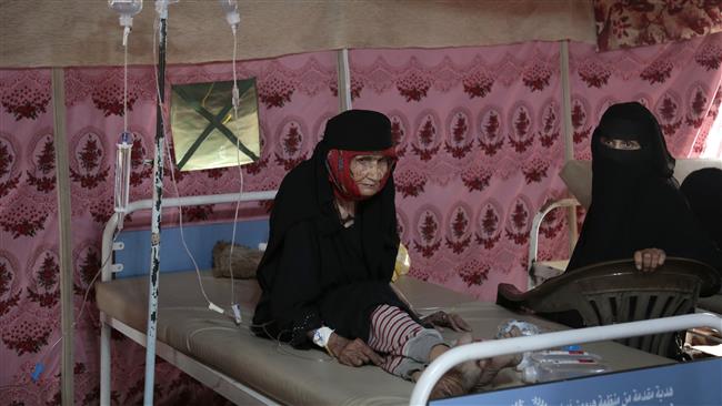 An elderly woman is treated for suspected cholera infection at a hospital in Yemen’s capital city of Sana’a on June 29, 2017. (Photo by AP)