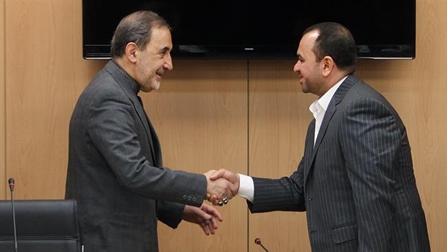 Ali Akbar Velayati (L), the senior adviser to Leader of the Islamic Revolution Ayatollah Seyyed Ali Khamenei on international affairs, shakes hands with the Secretary General of Iraq’s Islamic Virtue, Abdul Hussein al-Moussawi, in Tehran on August 21, 2017. (Photo by IRNA)