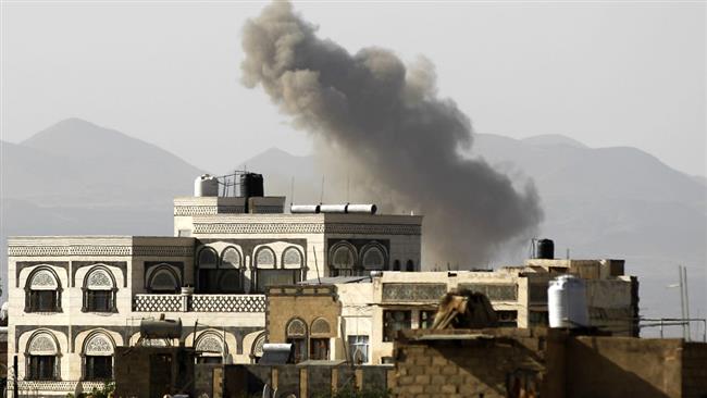 Smoke billows from buildings following a Saudi airstike in the Yemeni capital, Sana