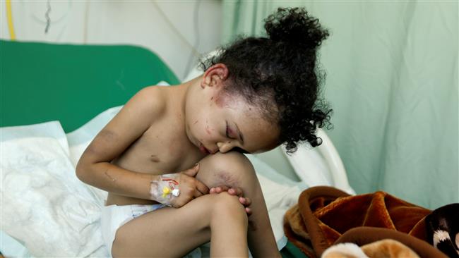 Buthaina Muhammad Mansour, believed to be four or five, sits on a bed at a hospital in Sana’a, Yemen, on August 26, 2017. She lost her parents, five siblings, and an uncle in a Saudi-led airstrike a day earlier. (Photo by Reuters)