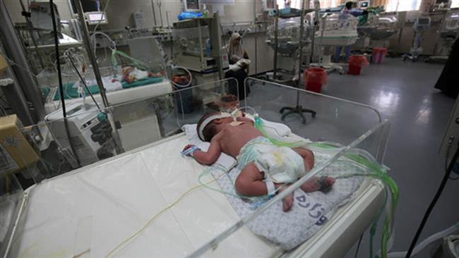 Newborns are seen inside incubators at the neonatal intensive care unit at the al-Shifa hospital in Gaza City on April 23, 2017. (Photo by AFP)