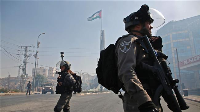 Israeli forces are seen during clashes with Palestinians near the settlement of Beit El, on the outskirts of the city of Ramallah in Tel Aviv-occupied West Bank, on July 28, 2017. (Photo by AFP)