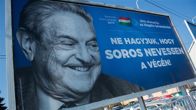 A poster with US billionaire George Soros is pictured in Szekesfehervar, Hungary, July 6, 2017. (Photo by AFP)
