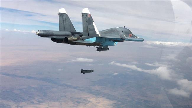 A Russian Su-34 fighter-bomber carries out a strike against Daesh forces in Syria.