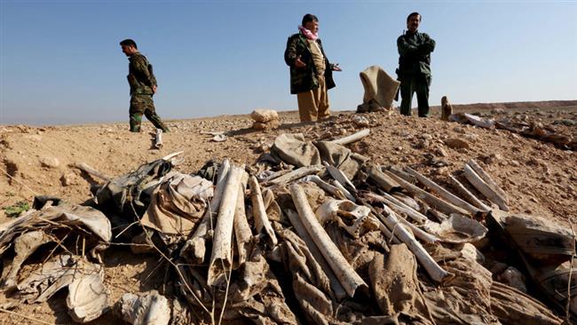 In this file photo, bones, suspected to belong to members of Iraq