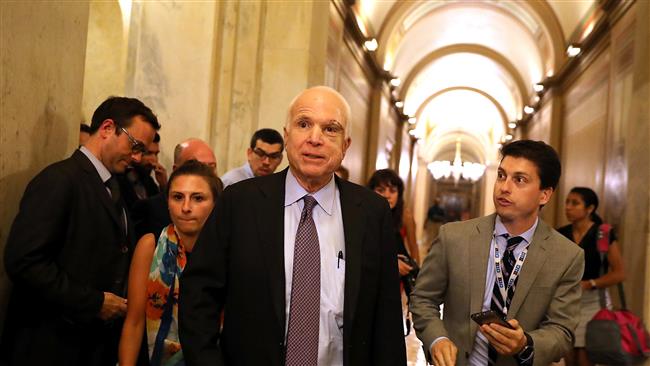 US Republican Senator John McCain leaves the the Senate chamber at the US Capitol on July 28, 2017 in Washington, DC. (Photo by AFP)