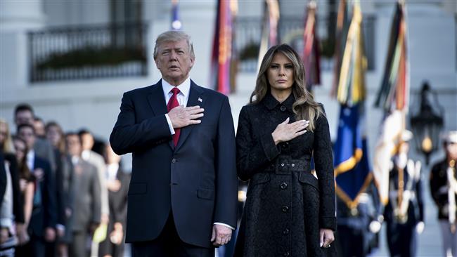 US President Donald Trump and First Lady Melania Trump observe a moment of silence on September 11, 2017, at the White House in Washington, DC, during the 16th anniversary of 9/11. (Photo by AFP)