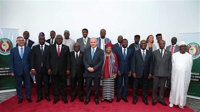 In this handout photograph, released by the press service of the Ivory Coast presidency on June 5, 2017, participants are seen at a meeting of the Economic Community of West African States (ECOWAS) in Monrovia, Liberia, on June 4, 2017. Israeli Prime Minister Benjamin Netanyahu (Front-5th from L) is among the attendees. (Via AFP)