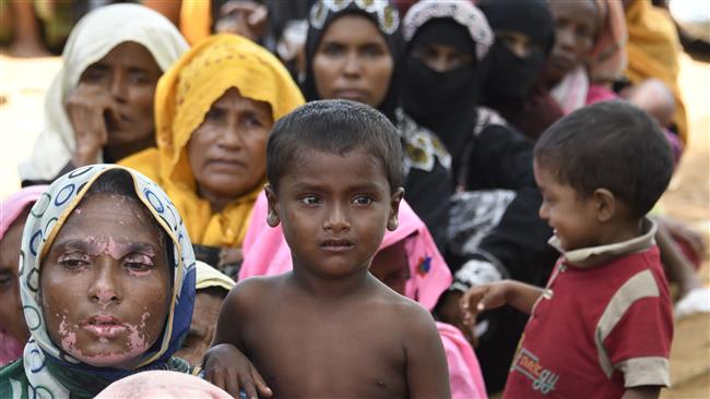 Rohingya refugees await registration at a government office in the Bangladeshi town of Ukhia on September 15, 2017. (Photo by AFP)